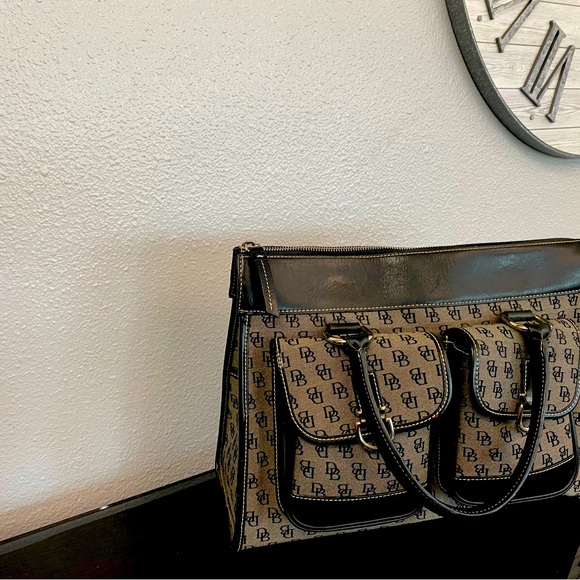 65.00 used Dooney  Burke in excellent condition!!! - Picture 1 of 2